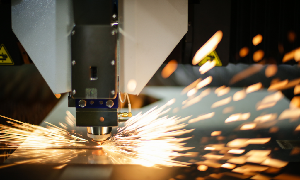 Image showing a futuristic production line where lasers are shown shaping 3D-printed metal components.