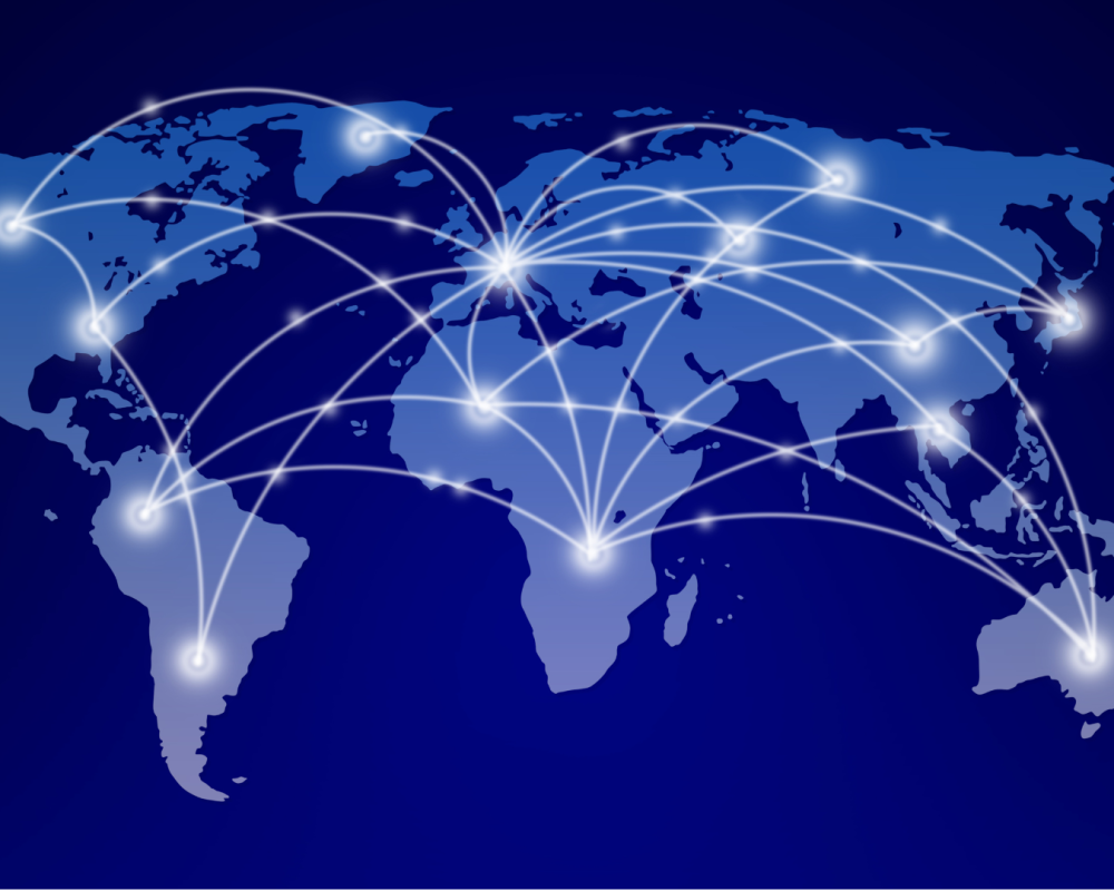 A world map with bright lines connecting major cities, representing a global network of communication and data sharing